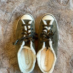 Green Converse mules. Lined foot bedding. Ribbon tie lacing.